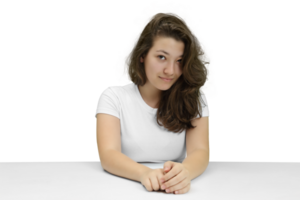 young and friendly teacher at her desk in front of the class on neutral background png