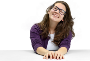 young and friendly teacher at her desk in front of the class on neutral background png