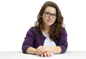 young and friendly teacher at her desk in front of the class on neutral background png
