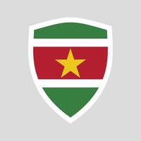 Suriname Flag in Shield Shape Frame vector