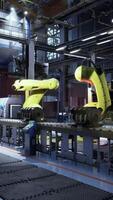 fabrik med robotar på transportband bälte video