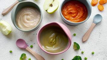 Healthy baby food in bowls. video