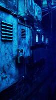 A dark alley with a blue light coming from it video