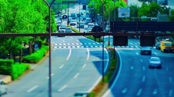 A timelapse of miniature city street at Yasukuni avenue in Tokyo daytime panning video