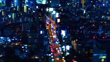 A night timelapse of miniature highway at the urban city in Tokyo tiltshift tilting video