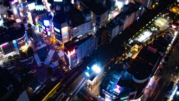 en natt Timelapse av miniatyr- shibuya korsning bred skott hög vinkel tiltshift panorering video