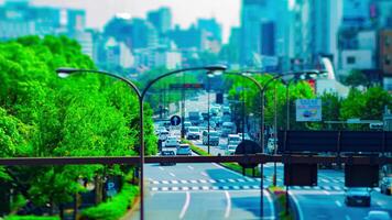 A timelapse of miniature city street at Yasukuni avenue in Tokyo daytime panning video