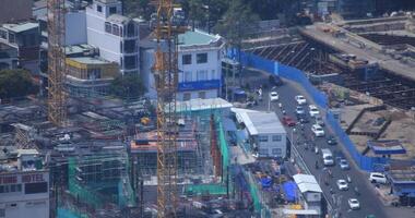 A traffic jam near the under construction in Ho Chi Minh high angle long shot video