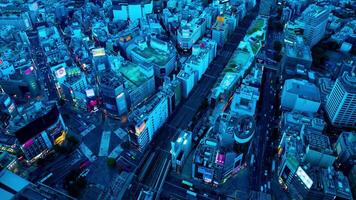 A dusk timelapse of panoramic cityscape at Shibuya area high angle wide shot video