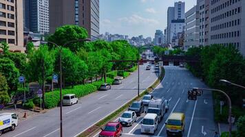 A timelapse of city street at Yasukuni avenue in Tokyo daytime wide shot tilt video