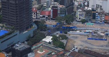 A traffic jam near the under construction in Ho Chi Minh high angle long shot video