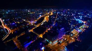 un noche lapso de tiempo de paisaje urbano en Ho chi minh alto ángulo amplio Disparo video