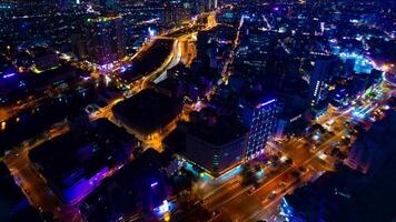 uma noite espaço de tempo do paisagem urbana dentro ho chi minh Alto ângulo Largo tiro panning video