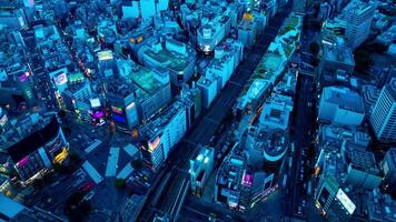 A dusk timelapse of panoramic cityscape at Shibuya area high angle wide shot zoom video