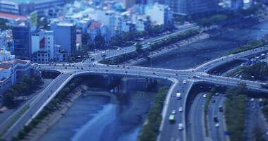 en trafik sylt på de miniatyr- upptagen stad i ho chi minh hög vinkel tiltshift video
