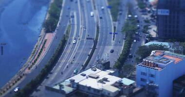 A traffic jam at the miniature busy town in Ho Chi Minh high angle tiltshift video