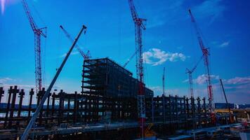 A timelapse of cranes at the under construction in Tokyo video