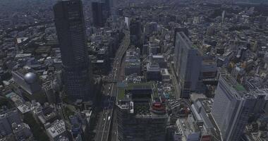 un' lasso di tempo di panoramico autostrada a shibuya la zona nel tokyo alto angolo video