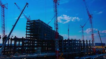 A timelapse of cranes at the under construction in Tokyo video