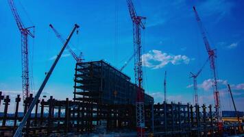 A timelapse of cranes at the under construction in Tokyo video