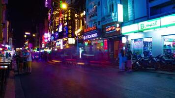 A night timelapse of the neon downtown at Bui Vien street in Ho Chi Minh Vietnam wide shot zoom video