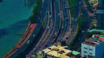 uma espaço de tempo do tráfego geléia às a ocupado Cidade dentro ho chi minh Alto ângulo grandes tiro inclinar video