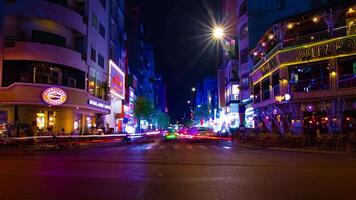 A night timelapse of the neon downtown at Bui Vien street in Ho Chi Minh Vietnam wide shot video