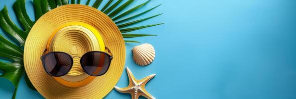 Summer blue banner with yellow accessories and monstera leaf on top view background photo