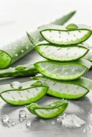 Close up of fresh aloe vera leaves with droplets vibrant green, moist and full of life photo