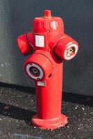 Fire hydrant in a french street in an emergency for firefighter intervention photo