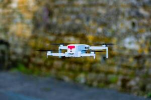 Drone in flight to make amazing videos and photographs seen from the sky photo