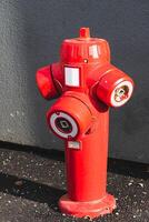 Fire hydrant in a french street in an emergency for firefighter intervention photo