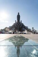 View of Ba Den mountain tourist area, Tay Ninh province, Vietnam. A unique Buddhist architecture with the highest elevation in the area view from below is very beautiful. photo