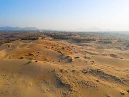 Aerial view of Nam Cuong sand dunes, Ninh Thuan province, Vietnam. It is one of the most beautiful places in Vietnam photo