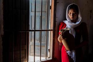 portrait of Cham ethnic girl in Bau Truc pottery village, Phan Rang city, Ninh Thuan province, Vietnam photo