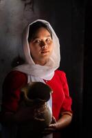 portrait of Cham ethnic girl in Bau Truc pottery village, Phan Rang city, Ninh Thuan province, Vietnam photo