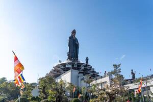 View of Ba Den mountain tourist area, Tay Ninh province, Vietnam. A unique Buddhist architecture with the highest elevation in the area view from below is very beautiful. photo