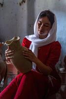 portrait of Cham ethnic girl in Bau Truc pottery village, Phan Rang city, Ninh Thuan province, Vietnam photo