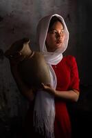 portrait of Cham ethnic girl in Bau Truc pottery village, Phan Rang city, Ninh Thuan province, Vietnam photo