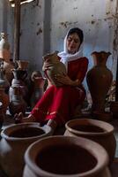 portrait of Cham ethnic girl in Bau Truc pottery village, Phan Rang city, Ninh Thuan province, Vietnam photo