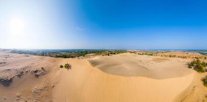 Aerial view of Nam Cuong sand dunes, Ninh Thuan province, Vietnam. It is one of the most beautiful places in Vietnam photo