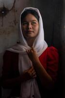 portrait of Cham ethnic girl in Bau Truc pottery village, Phan Rang city, Ninh Thuan province, Vietnam photo