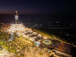 View of Ba Den mountain tourist area, Tay Ninh province, Vietnam. A unique Buddhist architecture with the highest elevation in the area view from below is very beautiful. photo