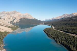 Aerial view of Bow Lake and the reflection of Mount Jimmy Simpson photo