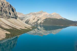 Aerial view of Bow Lake and the reflection of Mount Jimmy Simpson photo