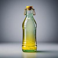 a bottle of olive oil sits on a table photo