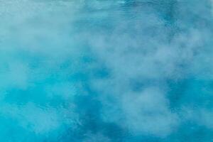 Turquoise abstract using the interior of a hot spring with steam photo