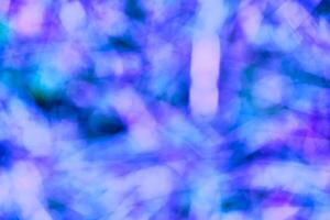 Purple and blue background with a texture of grass and grass clippings photo