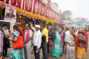 15th January 2023, Kolkata, West Bengal, India. Lining for taking morning breakfast at Kolkata Ganga Sagar Transit Camp photo