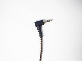 Black power cable with plug isolated on white background photo